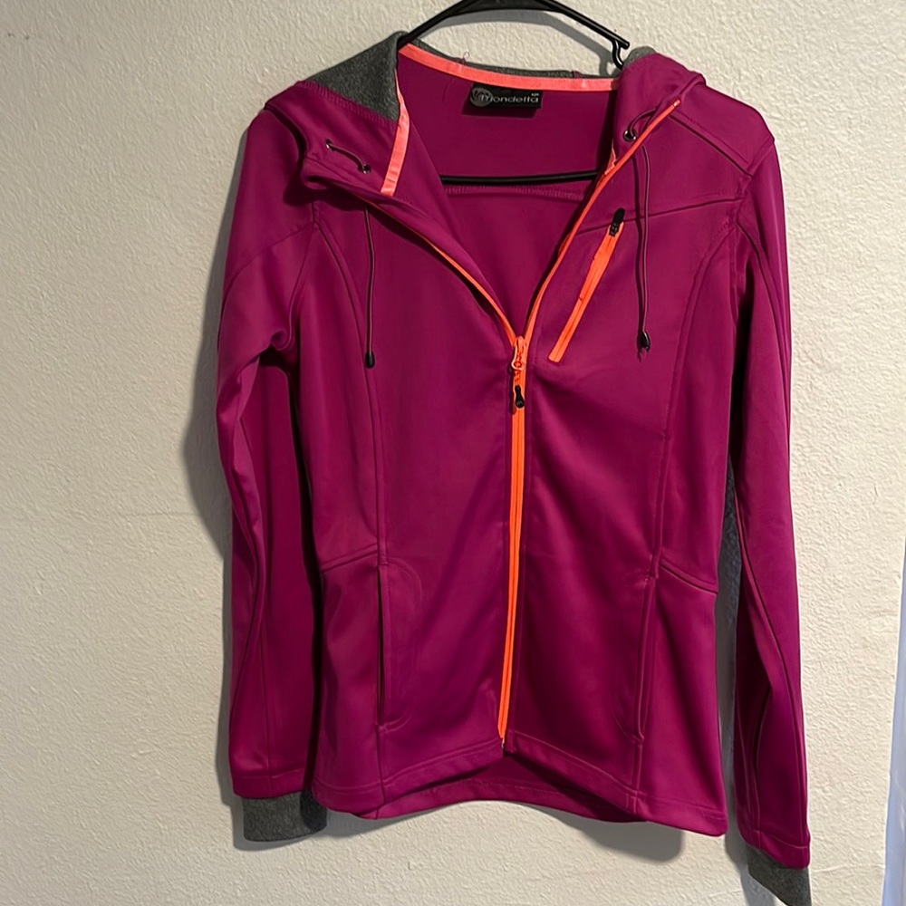 Pink hooded jacket.